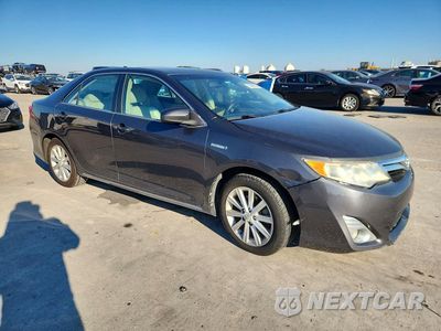 Czwarte zdjęcie samochodu z boku: 2012 TOYOTA CAMRY HYBRID XLE VIN:4T1BD1FK0CU025209 - miniatura
