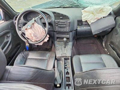 Zdjęcie 8 z 12 samochodu: 1998 BMW 323 IS AUTOMATIC VIN:WBABF8321WEH61182 - miniatura