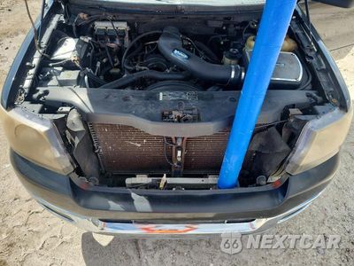 Zdjęcie 11 z 12 samochodu: 2005 FORD F150 VIN:1FTPX12555NA23163 - miniatura