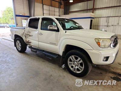 Czwarte zdjęcie samochodu z boku: 2015 TOYOTA TACOMA V6 VIN:3TMLU4EN9FM186589 - miniatura