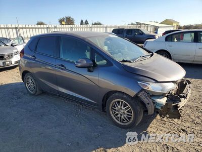 Czwarte zdjęcie samochodu z boku: 2017 HONDA FIT LX VIN:3HGGK5G56HM708531 - miniatura
