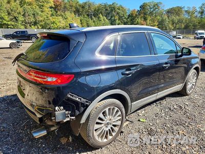 Trzecie zdjęcie samochodu z tyłu: 2016 LINCOLN MKC RESERVE VIN:5LMCJ3D98GUJ20886 - miniatura