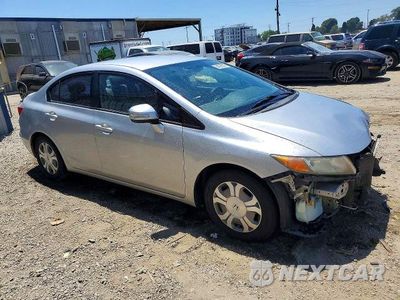 Czwarte zdjęcie samochodu z boku: 2012 HONDA CIVIC HYBRID VIN:JHMFB4F25CS000443 - miniatura