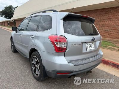 Trzecie zdjęcie samochodu z tyłu: 2014 SUBARU FORESTER 2.0XT TOURING VIN:JF2SJGPC9EH473176 - miniatura