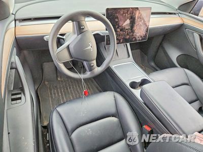 Zdjęcie 8 z 12 samochodu: 2023 TESLA MODEL Y VIN:7SAYGDEE7PF839765 - miniatura