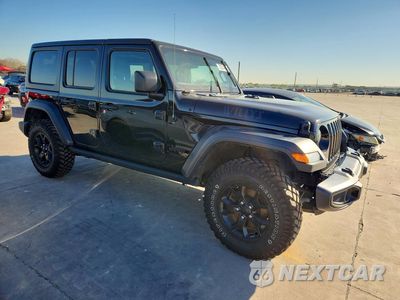 Czwarte zdjęcie samochodu z boku: 2021 JEEP WRANGLER UNLIMITED SPORT VIN:1C4HJXDN0MW816336 - miniatura