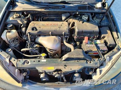Zdjęcie 11 z 12 samochodu: 2005 TOYOTA CAMRY LE VIN:4T1BE30K65U431287 - miniatura