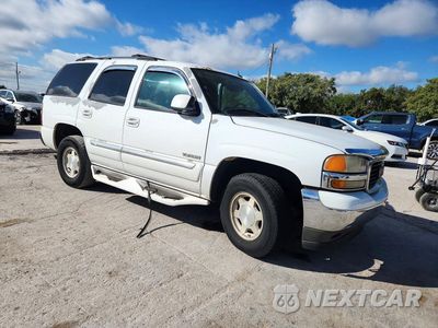 Czwarte zdjęcie samochodu z boku: 2005 GMC YUKON VIN:1GKEC13V15R202461 - miniatura