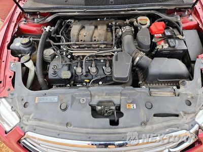 Zdjęcie 11 z 13 samochodu: 2016 FORD TAURUS SEL VIN:1FAHP2E88GG127739 - miniatura