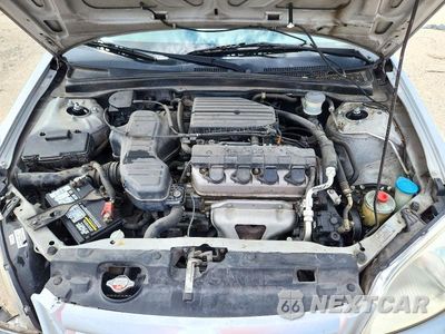Zdjęcie 11 z 12 samochodu: 2001 HONDA CIVIC LX VIN:1HGES16531L007230 - miniatura