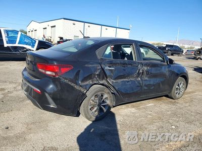 Trzecie zdjęcie samochodu z tyłu: 2022 KIA RIO S VIN:3KPA24ADXNE504805 - miniatura
