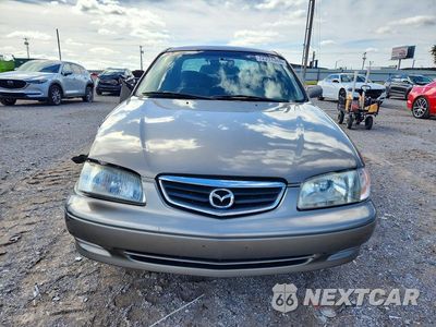 Piąte zdjęcie samochodu w środku: 2000 MAZDA 626 ES VIN:1YVGF22C3Y5169387 - miniatura