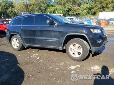 Czwarte zdjęcie samochodu z boku: 2014 JEEP GRAND CHEROKEE LAREDO VIN:1C4RJFAG5EC104895 - miniatura