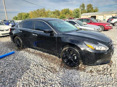 Czwarte zdjęcie samochodu z boku: 2018 NISSAN ALTIMA 2.5 SR VIN:1N4AL3AP6JC288430 - miniatura