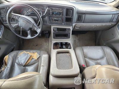 Zdjęcie 8 z 13 samochodu: 2004 GMC YUKON XL K1500 VIN:1GKFK16Z24J236766 - miniatura