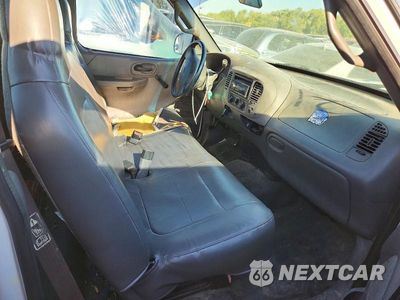 Zdjęcie 10 z 12 samochodu: 2001 FORD F150 VIN:1FTZF17231KF64847 - miniatura