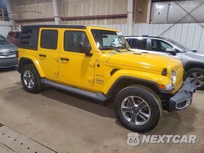 Czwarte zdjęcie samochodu z boku: 2020 JEEP WRANGLER UNLIMITED SAHARA VIN:1C4HJXEN9LW114514 - miniatura