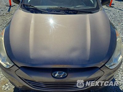 Zdjęcie 12 z 13 samochodu: 2011 HYUNDAI TUCSON GL VIN:KM8JT3AB0BU223658 - miniatura