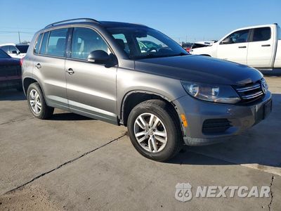 Czwarte zdjęcie samochodu z boku: 2016 VOLKSWAGEN TIGUAN S VIN:WVGAV7AX1GW523606 - miniatura