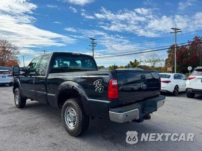 Czwarte zdjęcie samochodu z boku: 2014 FORD F250 SUPER DUTY VIN:1FT7X2B65EEB72347 - miniatura