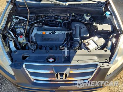 Zdjęcie 11 z 12 samochodu: 2005 HONDA CR-V LX VIN:JHLRD785X5C028370 - miniatura