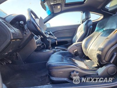 Zdjęcie 7 z 12 samochodu: 2004 HYUNDAI TIBURON GT VIN:KMHHN65FX4U118474 - miniatura