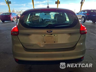 Zdjęcie 6 z 12 samochodu: 2016 FORD FOCUS TITANIUM VIN:1FADP3N26GL307826 - miniatura