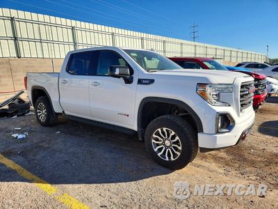 Czwarte zdjęcie samochodu z boku: 2021 GMC SIERRA K1500 AT4 VIN:3GTU9EETXMG182492 - miniatura