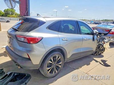 Trzecie zdjęcie samochodu z tyłu: 2021 FORD ESCAPE SE VIN:1FMCU0BZ4MUA29394 - miniatura