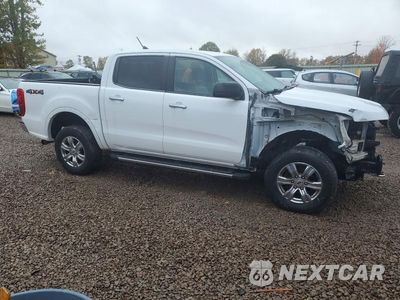 Czwarte zdjęcie samochodu z boku: 2019 FORD RANGER XL VIN:1FTER4FH2KLB17872 - miniatura