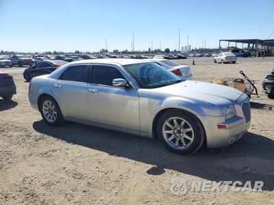 Czwarte zdjęcie samochodu z boku: 2010 CHRYSLER 300 TOURING VIN:2C3CA5CVXAH263208 - miniatura