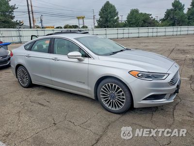 Czwarte zdjęcie samochodu z boku: 2018 FORD FUSION SE HYBRID VIN:3FA6P0LU2JR262050 - miniatura
