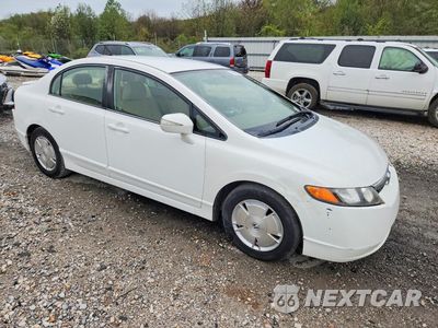 Czwarte zdjęcie samochodu z boku: 2006 HONDA CIVIC HYBRID VIN:JHMFA362X6S006630 - miniatura