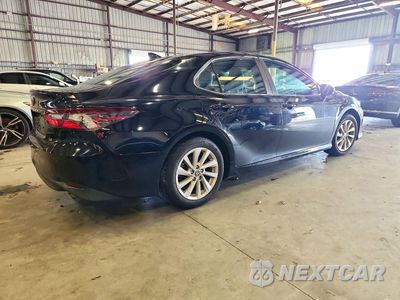 Trzecie zdjęcie samochodu z tyłu: 2023 TOYOTA CAMRY LE VIN:4T1C11AK7PU077916 - miniatura