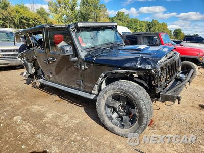 Czwarte zdjęcie samochodu z boku: 2015 JEEP WRANGLER UNLIMITED SAHARA VIN:1C4BJWEG2FL748951 - miniatura