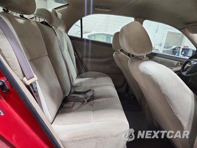 Zdjęcie 10 z 12 samochodu: 2005 TOYOTA COROLLA CE VIN:JTDBR32E352065641 - miniatura