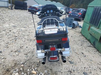Czwarte zdjęcie samochodu z boku: 2010 HARLEY-DAVIDSON FLHTCU VIN:1HD1FC416AB607533 - miniatura