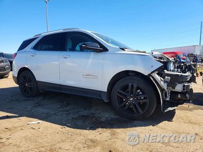 Czwarte zdjęcie samochodu z boku: 2020 CHEVROLET EQUINOX LT VIN:2GNAXLEX0L6230700 - miniatura
