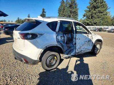 Trzecie zdjęcie samochodu z tyłu: 2014 MAZDA CX-5 TOURING VIN:JM3KE2CY7E0340462 - miniatura