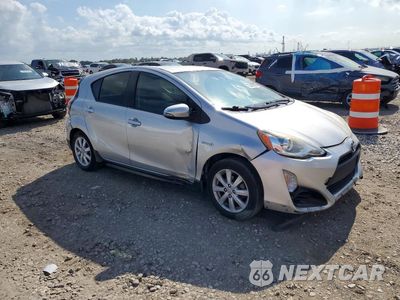 Czwarte zdjęcie samochodu z boku: 2017 TOYOTA PRIUS C TWO VIN:JTDKDTB36H1594833 - miniatura