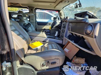 Zdjęcie 7 z 14 samochodu: 2004 HUMMER H2 VIN:5GRGN23U04H114421 - miniatura
