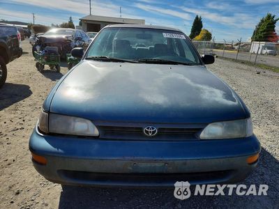Piąte zdjęcie samochodu w środku: 1995 TOYOTA COROLLA DX VIN:1NXAE09B2SZ314752 - miniatura