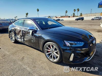 Czwarte zdjęcie samochodu z boku: 2023 AUDI RS5 VIN:WUAAWCF56PA902778 - miniatura