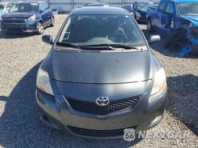 Piąte zdjęcie samochodu w środku: 2010 TOYOTA YARIS BASE VIN:JTDBT4K39A1377422 - miniatura