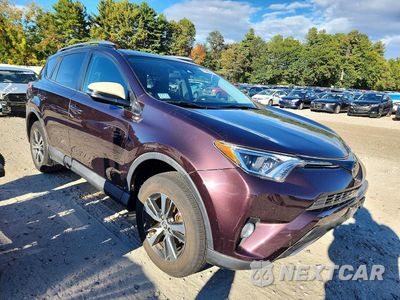 Czwarte zdjęcie samochodu z boku: 2018 TOYOTA RAV4 XLE VIN:2T3RFREV8JW715085 - miniatura