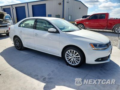 Czwarte zdjęcie samochodu z boku: 2014 VOLKSWAGEN JETTA SEL VIN:3VWL07AJ1EM389097 - miniatura
