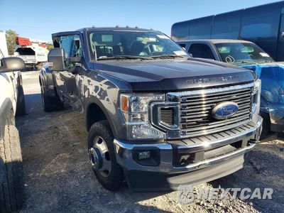 Czwarte zdjęcie samochodu z boku: 2021 FORD F350 SUPER DUTY VIN:1FT8W3DT3MED66700 - miniatura