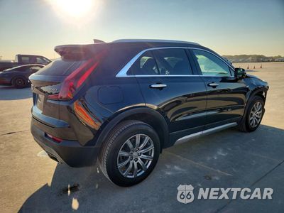 Trzecie zdjęcie samochodu z tyłu: 2023 CADILLAC XT4 PREMIUM LUXURY VIN:1GYFZDR43PF123063 - miniatura
