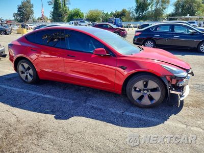 Czwarte zdjęcie samochodu z boku: 2023 TESLA MODEL 3 VIN:5YJ3E1EA8PF431994 - miniatura