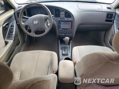 Zdjęcie 8 z 12 samochodu: 2005 HYUNDAI ELANTRA VIN:KMHDN46DX5U053319 - miniatura